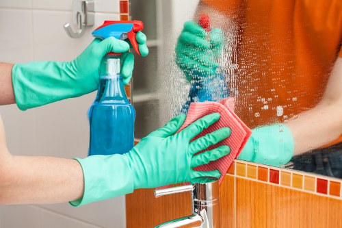 Cleaner entering a home for a scheduled service