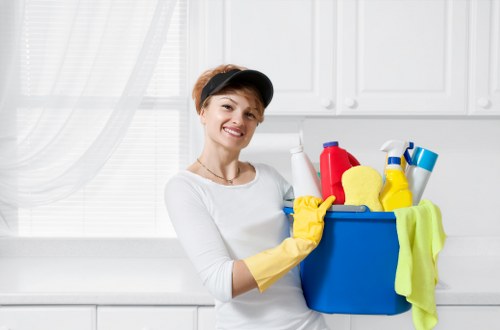 Worker following safe cleaning practices with proper handling