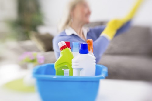 Professional cleaner in Finchley handling deep cleaning tasks